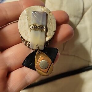 One Clip On Earring in Holographic Pouch